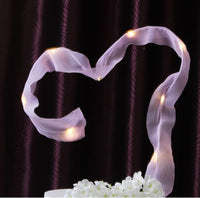 LED purple ribbon cake topper